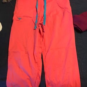 Med couture coral scrub pants Womens medium